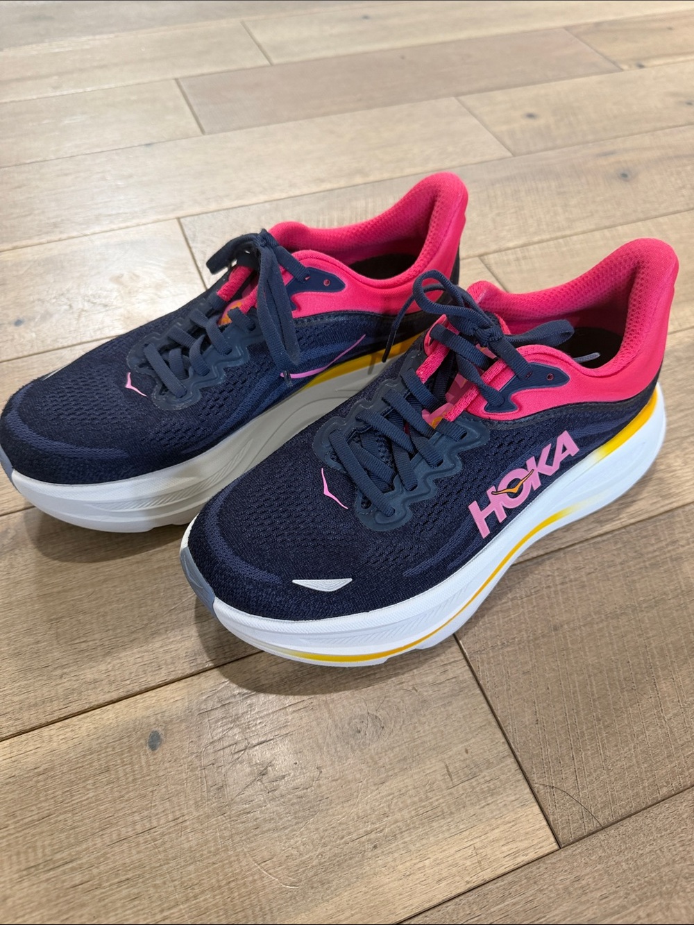 Hoka Women's Bondi 8 Navy with Pink and Yellow Running Sneakers